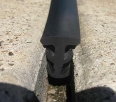 a black pipe sticking out of the ground