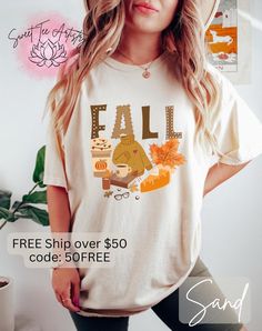 🍂Fall Favorites Shirt - Embrace the Cozy Vibes of Autumn🍂 Capture the essence of Autumn with our exclusive Fall Favorites Shirt from Sweet Tee Artistry! This unique design brings together all the comforts of the season, featuring a delightful Pumpkin Spice Latte, a cozy sweater, a book with reading glasses, a slice of pumpkin pie, and a beautiful fall leaf. Perfect for those who cherish the magic of fall, this shirt is a must-have addition to your seasonal wardrobe. Whether you're sipping on your favorite spiced beverage, enjoying a good book by the fire, or indulging in delicious pumpkin pie, our Fall Favorites Shirt will keep you feeling cozy and stylish. Key Features: 🍂Design Elements: Pumpkin Spice Latte, Cozy Sweater, Warm Fire with a Book, Pumpkin Pie, Fall Leaf 🍂Available Styles Comfortable Fall Outfits, Pumpkin Spiced Latte, Cozy Sweaters Autumn, Pie Pumpkin, Sweet Tee, Seasonal Wardrobe, Fall Leaf, Seasonal Celebration, Cozy Vibes