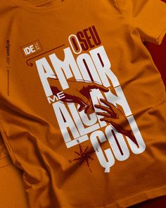 an orange t - shirt with the words'o seu amok alchy go'printed on it