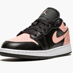 The Air Jordan 1 Low Crimson Tint Is Executed In A Two-Tone Black And Crimson Tint Color Block. The Air Jordan 1 Low Crimson Tint Upper Features A Mix Of Salmon Pink And Black Leather Inserts Covering The Forefoot, Eyelets, And Mid-Panel. The Usual Branding Is Present With The Logo Jumpman Embroidered On The Tongue, The Swoosh Running Across Both The Lateral And Medial Sides, And The Jordan Wings Embroidered At The Back. A White Rubber Midsole And Contrasting Black Outsole Round Out The Look. Sporty Pink Leather Jordan Shoes, Pink Low-top Leather Jordan Shoes, Pink Leather Basketball Shoes With Round Toe, Pink Jordan Sports Shoes With Cushioned Footbed, Pink Leather Basketball Shoes With Contrast Sole, Sporty Pink Jordan Shoes With Rubber Sole, Pink Jordan Shoes With Cushioned Footbed For Sports, Sporty Pink Low-top Jordan Shoes, Pink Low-top Basketball Shoes With Contrast Sole