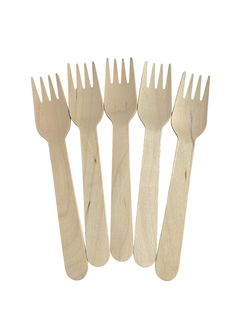 six wooden forks are lined up next to each other