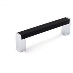 a black and white bench sitting on top of a white floor