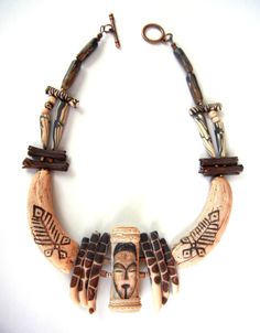 "Hunter" - Polymer clay necklace by Sonya Girodon. Neolithic Jewelry, Primitive Jewelry, Wood Jewelery, Natural Accessories, Assemblage Jewelry, Polymer Jewelry, Polymer Clay Necklace, Neck Jewellery, Clay Necklace