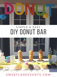 a table with donuts on it and the words, simple & easy diy donut bar