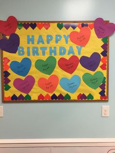 a happy birthday bulletin board with hearts on it