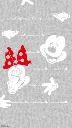 an image of mickey mouse with red bow on his head and hands in the air