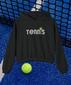 Retro Tennis Sweatshirt, Sports Mom Shirt, Tennis Club Sweater, Tennis Shirt, Women's Sweatshirt, Cinched Bottom Hoodie, and Tennis Gift for Her. Style stacked upon style: this hoodie is an absolute must for any cold day. Made with a boxy, oversized fit, it hits all the cozy marks one needs to feel at home wherever they are. The mid-length design along with the cinched elastic hem, add extra fashion points for any casual outing while the 52% Airlume cotton and 48% ring-spun cotton/polyester fleece blend feels impeccable to the touch.  PRODUCT INFORMATION .: 52% Airlume combed and ringspun cotton, 48% polyester (Athletic Heather is 90/10 Airlume combed and ring-spun cotton/polyester fleece) .: Medium-heavy fabric (8 oz/yd² (271 g/m .: Oversized fit .: Tear-away label CARE INSTRUCTIONS: Turn Team Spirit Long Sleeve Tops With Drawstring Hood, Moisture-wicking Hooded Tops For Sports Events, Sporty Long Sleeve Hoodie With Letter Print, Workout Sweatshirt With Drawstring Hood For Sports Season, Workout Sweatshirt With Drawstring Hood, Sporty Sweats For Sports, Moisture-wicking Hooded Tops For Sports Season, Sports Event Hoodie With Drawstring Hood, Team Spirit Top With Drawstring Hood