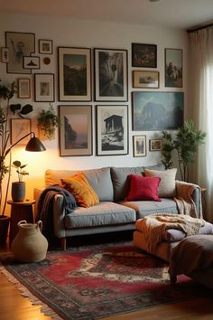 a living room filled with lots of pictures on the wall and furniture in front of it