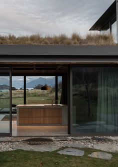 a modern house with an outdoor hot tub