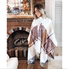 This Cozy Poncho Is Such An Essential For Fall Or Winter Adventures. It Goes With Everything From Jeans To Leggings! Toss This Stylish Poncho On Over A Plain Long Sleeve Top, Black Leggings Or Jeans And Classic Tall Boots. 100% Acrylic Hand Wash Cold One Size Fits Most White Oversized Winter Poncho, Oversized White Poncho For Winter, White Casual Winter Poncho, Casual White Winter Poncho, White Long Sleeve Poncho For Fall, White Fall Poncho, Cozy Oversized White Poncho, White Cozy Winter Poncho, Casual White Poncho For Fall