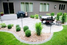 an outdoor patio and landscaping area