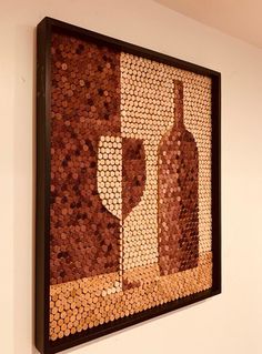 a painting made out of wine bottles on the wall