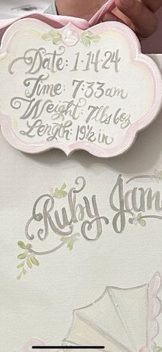 a close up of a baby's birth announcement