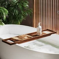 a bathtub with soap and shampoo in it