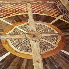 a wooden table with an intricate design on it