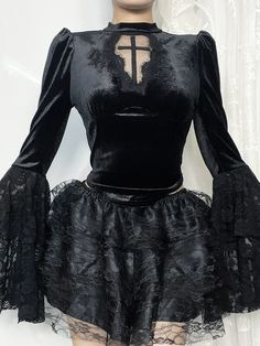 Unleash your inner confidence with our stunning See-through Cross Top! The shrug shoulders add a touch of elegance, while the rose lace patchwork sleeves create a romantic feel. Made with a blend of polyester and spandex, this top is both comfortable and chic. Perfect for making a statement! See-through cross, Shrug sh Gothic Party Top With Mesh Sleeves, Gothic Party Tops With Mesh Sleeves, Gothic Party Tops With Sheer Sleeves, Gothic Lace Top For Fall, Gothic Lace Tops For Fall, Lace Tops With Mesh Sleeves For Party, Gothic Tops With Sheer Sleeves For Night Out, Gothic Tops With Sheer Sleeves For Spring, Gothic Tops With Lace Trim For Fall