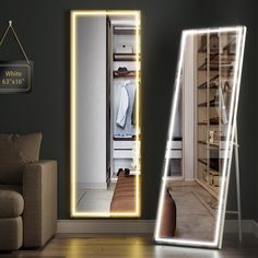 a large lighted mirror sitting on top of a wooden floor