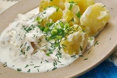 potato salad with sour cream and chives on a plate