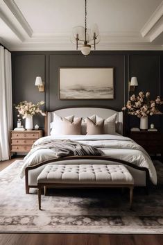 a large bed sitting in a bedroom on top of a hard wood floor next to a window