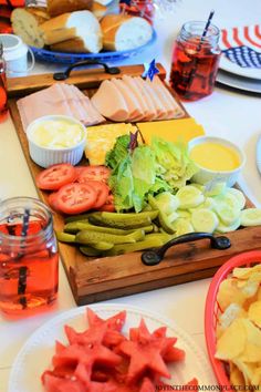 a table topped with plates and bowls filled with food