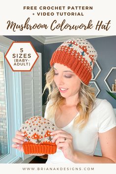 a woman is holding a crochet hat in front of a window with text overlay that reads, free crochet pattern and video tutor mushroom colorwork hat