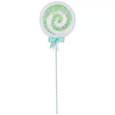 a green and white lollipop on a stick