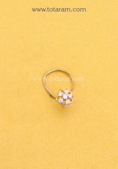 18 Karat Gold Diamond Nose Pin  - 235-NP032 - in 0.400 Grams for USD $124.57. 
Made in India by Totaram Jewelers Online this product is in Gold - 18 Karat Gold  & is an excellent gift for Adult - Women. Ships fully insured with secured guaranteed delivery for free with your order over $250 from New Jersey USA & comes with 30 days exchange policy. 14k Gold Wedding Nose Rings, Diamond Nose Rings For Anniversary, 14k Gold Nose Rings For Wedding, Elegant 14k Yellow Gold Nose Rings, Yellow Gold Diamond Nose Rings, Diamond Nose Studs In Yellow Gold For Gift, Gold Diamond Nose Ring Gift, Diamond Yellow Gold Nose Studs For Gift, Gold Diamond Nose Studs As Gift