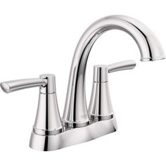 a chrome faucet with two handles