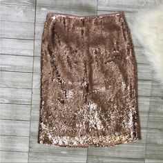 Worn Once To Try On, In Like New Excellent Condition And Absolutely Stunning! You Can Wear This To A Dressy Event With Heels And A Silk Cami Or Dress Down With A White Tshirt. Surprisingly Versatile! Jcrew Sequin Midi Skirt Size 4 In Pink Rose Gold. Fully Lined. Back Zip. Sits At Waist And Falls Below Knee. Runs True To Size According To Jcrew’s Website. Approximate Measurements Length 27” Waist 14” No Trades Fast Shipping Smoke And Pet Free Home Lowball Offers Will Be Declined But Reasonable Offers Are Always Welcome! Sequin Midi Skirt, Silk Cami, Rose Gold Pink, Pink Sequin, Dressed Down, White Tshirt, Try On, Pink Rose, Pink And Gold