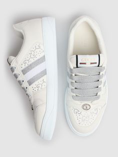 Find GUCCI 35mm Screener Leather Sneakers on Editorialist. Light grey leather . White GG Crystal canvas insert . Grey and white Web . Oval enameled detail with metal Double G. Label with Gucci vintage logo . Bi-color sole White Gucci Sneakers With Logo Detail, Luxury White Sneakers With Embroidered Logo, Luxury Silver Sneakers With Metallic Logo, Luxury Silver Leather Sneakers, Luxury White Sneakers, Versace Brand, Gucci Vintage, Gucci Sneakers, Ski Accessories