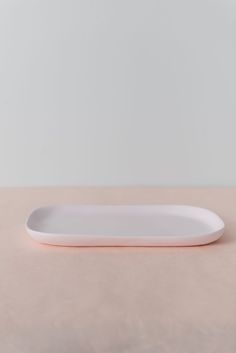 a white plate sitting on top of a table