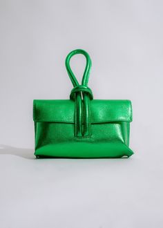 Stylish and elegant Dolce & Precious Glitter Handbag in vibrant green color with intricate detailing and sparkling accents Green Top Handle Box Bag With Dust Bag, Green Shoulder Box Bag With Dust Bag, Green Shoulder Box Bag, Green Clutch Box Bag With Dust Bag, Luxury Green Clutch Evening Bag, Glamorous Shoulder Bag With Detachable Strap For Everyday, Chic Green Pouch Bag, Luxury Green Handheld Box Bag, Luxury Green Evening Bag For Gifting