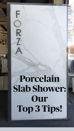 a white marble sign with the word forza on it