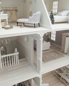 a doll house with all white furniture and accessories in it's display case on instagram