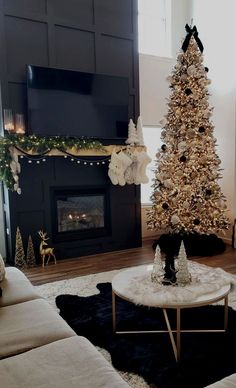 a living room filled with furniture and a christmas tree