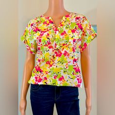 This Is A Gorgeous Top Perfect For Your Next Vacation! Rilled Short Sleeves, V-Neck, Small Chest Pockets. Can Be Worn Blousy Or Tucked In. Very Luxurious Feel. This Is Nwot From A Smoke Free Home. Originally $49.95. Size Small But Is Oversized With Ptp At 20” (No Stretch) And Length At 27”. Bundle & Save With Many Other Great Finds By Visiting My Closet @Youfoundcoco. Yellow Stretch V-neck Top, Stretch V-neck Multicolor Blouse, Multicolor Stretch V-neck Blouse, Stretch Multicolor V-neck Blouse, Summer Multicolor Split Neck Tops, Multicolor Split Neck Top For Spring, Multicolor Split Neck Summer Top, Multicolor Split Neck Top For Summer, Green Split Neck Top For Spring