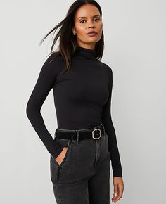 This infinitely wearable turtleneck is a cool-weather essential — in a soft knit. Turtleneck. Long sleeves.,Hit:24 1/2" long,Imported:Imported,Fit:Soft & stretchy fit,Length:24 1/2" long,Fabrication:91% Nylon, 9% Spandex,Garment Care:Machine Washable Long-Sleeve Turtleneck Top by Ann Taylor Size regular - M/L Black Women's Turtleneck, Long, Sleeve, Knits, Tops, 91%, Nylon, 9%, Spandex, Machine, Washable Elegant Fitted Black Mock Neck Top, Chic Fitted Black Mock Neck Top, Versatile Fitted Black Mock Neck Top, Sleek Black Stretch Mock Neck Top, Chic Black High-stretch Turtleneck, Womens Turtleneck, Mock Neck Top, Long Sleeve Turtleneck, Turtle Neck Top