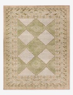 a green and beige rug with an intricate design