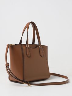 Find MICHAEL KORS Shoulder Bag on Editorialist. The MICHAEL Michael Kors Leather Shoulder Bag is crafted from leather and features a top handle and an adjustable shoulder strap. The bag also includes a logo charm and a push lock closure. The shoulder bag is small in size and can be worn on the shoulder or carried by hand. Michael Kors Leather Top Handle Satchel, Brown Saffiano Leather Satchel With Detachable Handle, Brown Saffiano Leather Satchel For Daily Use, Michael Kors Rectangular Leather Bag, Michael Kors Leather Work Bag, Michael Kors Leather Bags With Double Handle, Michael Kors Leather Satchel Bag, Michael Kors Leather Bag For Daily Use, Michael Kors Tote Satchel With Top Carry Handle