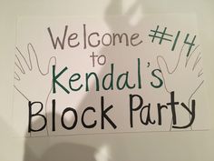 a sign that reads welcome to kendal's block party with hands drawn on it