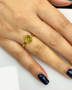 Natural Peridot Ring * Dainty Cabachon Ring * Genuine Peridot & 14K Solid Gold * Best Gift for Her/Him * Handmade Ring ◎ Details ◎ ○ Gemstone Details .Natural PERIDOT Oval Cut 9X7 mm approx. 2.01 ct ○ Gold Details 14K Solid Gold Width of Band : 2.50 mm Weight of Ring : approx 3.80 gr Made to Order HANDMADE ITEM ○ Upgrade to Solid 18K Gold, please click the link below: https://www.etsy.com/listing/962826004 For more CABACHON BEZEL rings : http://etsy.me/37fvI60 ○ PERIDOT RINGS : https://etsy. Peridot Rings, Dainty Band, Topaz Color, Peridot Stone, Bezel Ring, August Birthstone, Best Gifts For Her, Peridot Ring, August Birth Stone