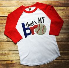 a red and white baseball shirt with the words that's my pro on it