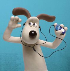 a cartoon dog with headphones and a cell phone in his hand, holding a cord