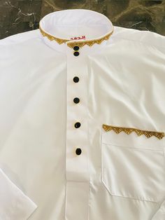 Introducing the Wahed Luxury Mens White Wedding Thobe. It is fitting for Muslim men for a wedding or their Nikkah ceremony.  Size: 60  Material: Polyester This thobe is a more lightweight and thinner material for a cooling effect. This handmade thobe was produced with the utmost precision, and presents a seamless blend of traditional design and contemporary style. This Elegant Prayer Thobe, Muslim Mens Clothing, Galabia For Men, Men Thawb, Men Arab Outfits is perfect choice for Islamic Gift For Men, Gift For Muslim Dad, Gift For Muslim Husband and Islamic Fathers Day Gift. Jubbah Men, Muslim Men Clothing, Nikkah Ceremony, Islamic Wear, Dress Suits For Men, Muslim Men, Islamic Gifts, Dress Suits, Mens Clothing