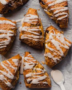 several pieces of bread with icing on top