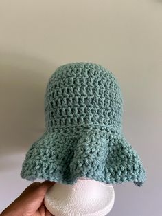 This crochet wavy ruffle hat is made in a pet free, smoke free environment. Beach Crochet Hat With Ruffles, Ruffled Crochet Beach Hat, One Size Fits Most, Ruffled Crochet Hat For Beach, Ruffled Crochet Beach Hat, Ruffled Crochet Hat With Curved Brim, Brimmed Crochet Hat With Ruffles, Adjustable Crochet Hat With Ruffles And Curved Brim, Casual Brimmed Hat With Ruffles, Curved Brim Hat With Ruffles