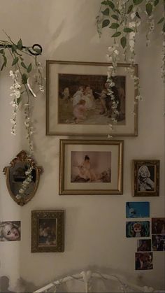 there are pictures on the wall with baby's breath