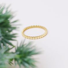 Your Dainty Dot Ring is stylish, dainty and pretty ideal for everyday use. Details of solid gold handmade Flat Bead Eternity Band are very eye-catching. It is a great gift for your loved ones. This jewelry will be an indispensable piece of yours. This meaningful Flat Bead Stacking Ring with high quality handwork will be a legacy you can leave to your family its.  * Flat Beaded Ring Details * Material / Gold Kt:  14K (585), 18K (750), 8K (333) * Available Gold Colors: Yellow Gold, White Gold, Ros Gold Beaded Wedding Rings, Adjustable Round Ring With Tiny Beads, Adjustable Ring With Tiny Beads, Adjustable Rings With Tiny Beads, Minimalist Beaded Round Rings, Beaded Stacking Rings, Dot Ring, Beaded Ring, Beaded Wedding