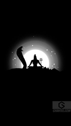 the silhouette of a person sitting on top of a hill in front of a full moon