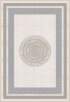 a white rug with blue and grey greek designs on the border, in front of a beige background